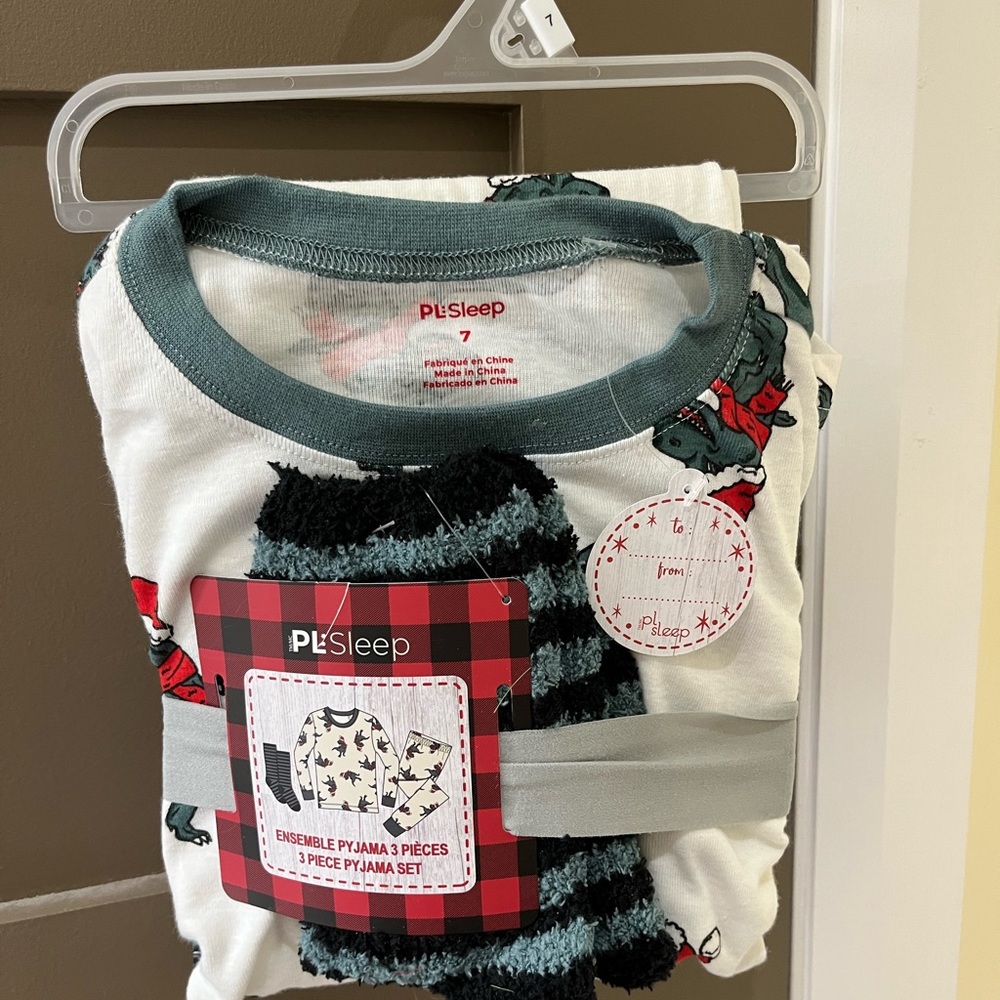 Christmas Dinosaur pajama set.  Size 7